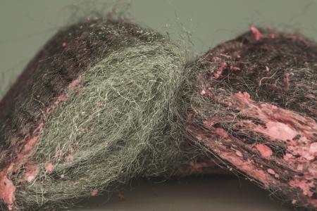 Close up of steel wool with pink soap padsの写真素材