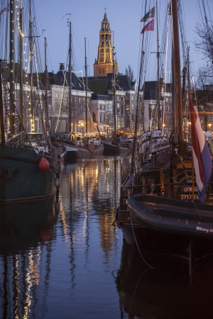 GRONINGEN,NETHERLANDS-DEC 20, 2012:Winter sail event WinterWelVaart in the Dutch city of Groningen at dusk.

のeditorial素材