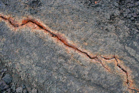 Pink crack in purple rock in Iceland   Real colors の写真素材