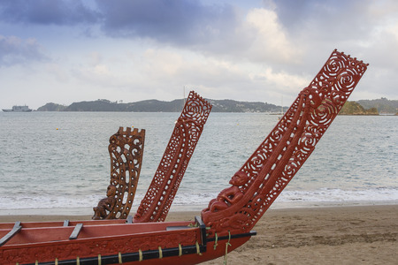Traditional Maori wood carved canoes on the shore at Waitangi n New Zealand の写真素材