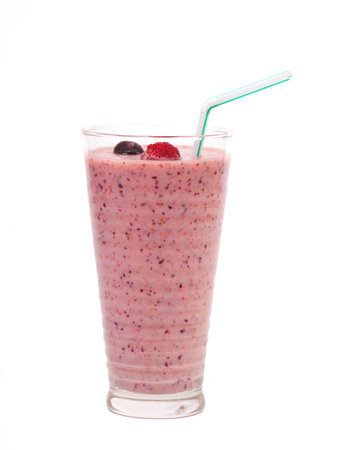 Fruit smoothie in a glass with strawの写真素材