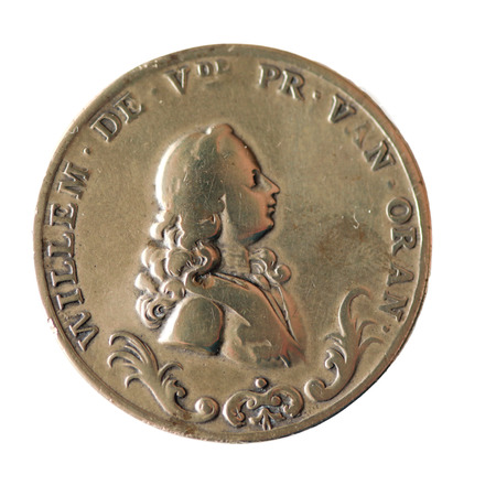 Head side of a very old Dutch bronze eternal calender coin of 1767 with the image of  William V , Prince of Orange Gift for business relations in the 18th century   On the coin side is the eternal calender shown with the date 1767 の写真素材