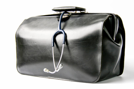 black leather doctor's bag with stethoscope hanging out の写真素材