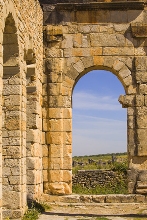 View through a temple at Volubilis in Moroccoの写真素材