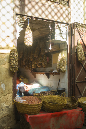 FES - MAY 7: Unknown man selling snails at a Market (souk) in  Fes in Morocco on May 7, 2013. The market is one of the most important tourist attractions of the city.のeditorial素材