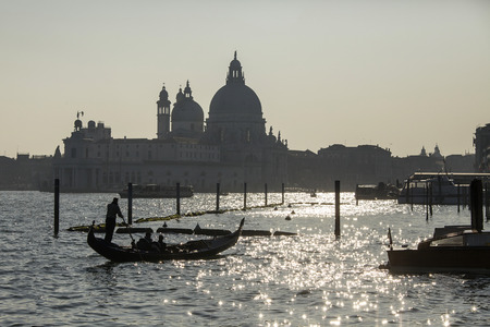 Gondola tour on the Lagoon in Venice at sunsetの写真素材