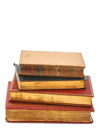 Pile of antique books of the 19th century with golden pagesの写真素材