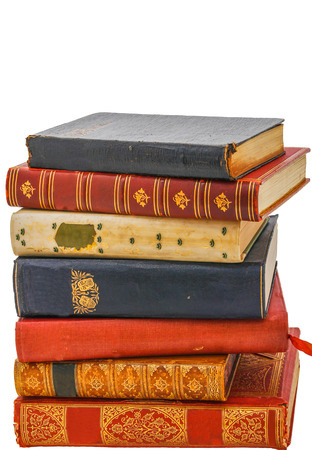 A stack of very old antiquarian books in leather covers.の写真素材