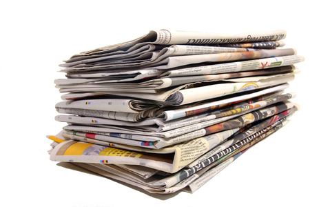 Stack of Dutch newspapers on whiteの写真素材