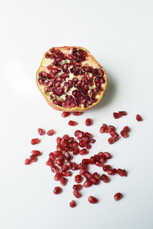 Ripe pomegranate fruit with seeds の写真素材