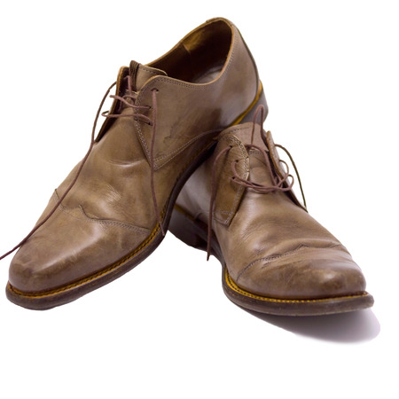 Modern grey leather shoes for men isolated on whiteの写真素材