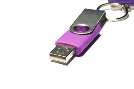 Small portable USB flash disk drive in pink 

の写真素材