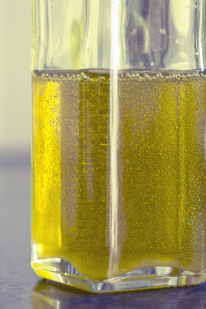 Close up of a bottle with olive oilの写真素材