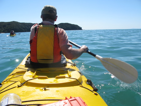 Man kayaking on the Abel Tasman Bay in New Zealandの写真素材