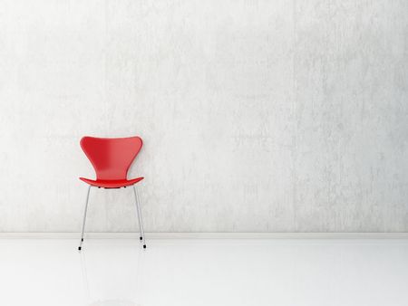 red Chair to  face a blank wallの写真素材