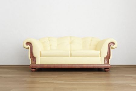 Couch to face a blank wallの写真素材