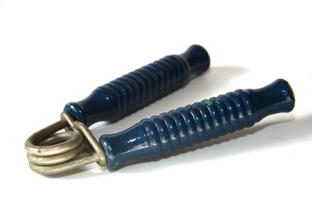 A hand exercising gear isolated on the white background.の写真素材