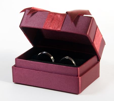 Close up shot of wedding band in white background.の写真素材