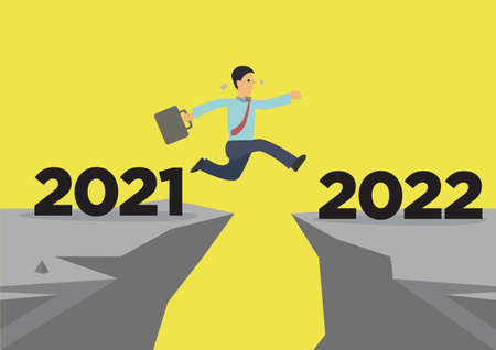 Business man jump over from 2021 to 2022. Success new year concept or reaching out to the year of...