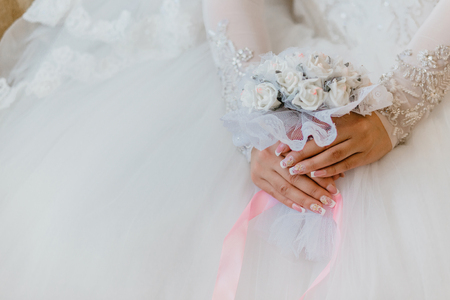 bride with wedding bouquetの写真素材
