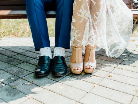 feet of the bride and groomの写真素材