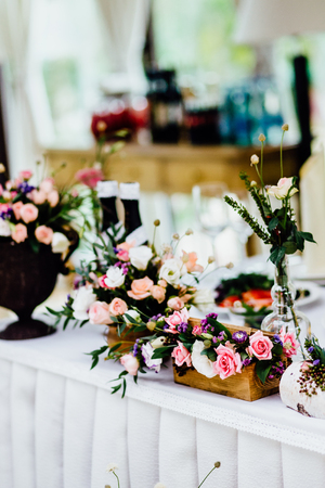 wedding reception table with flowersの写真素材