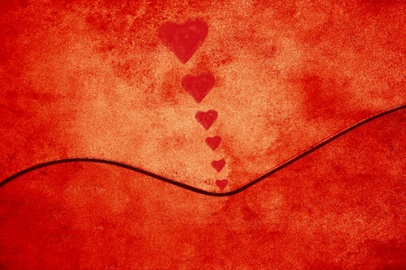 Red background texture with a feminine curveの写真素材