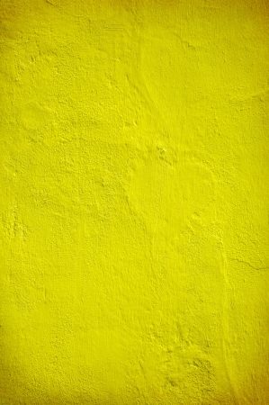 Plastered yellow green wall in closeupの写真素材
