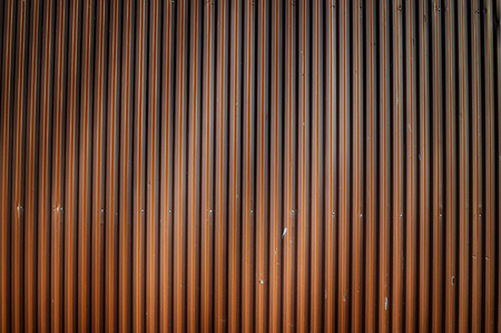 Corrugated iron wall with birdshit and spider webb.の写真素材