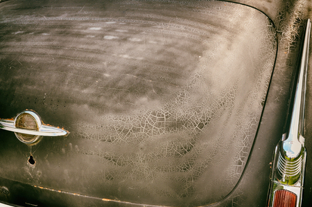 Closeup of retro car with cracked paint.の写真素材