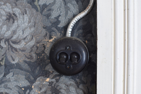 Closeup of retro light switchの写真素材