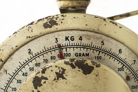 Vintage rusty kitchen scale in closeupの写真素材