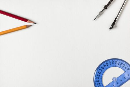 pencil and ruler on a white background