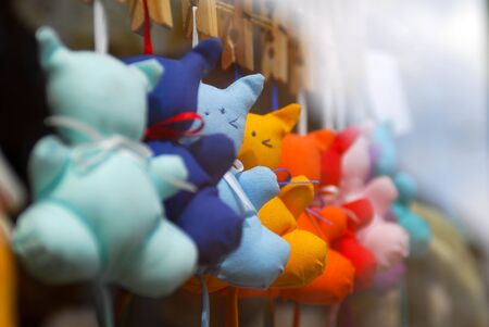multicolored toys in market in the center of cityの写真素材