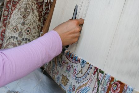 Girl does the Turkish carpetの写真素材