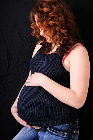 beautiful pregnant woman expecting a baby girlの写真素材