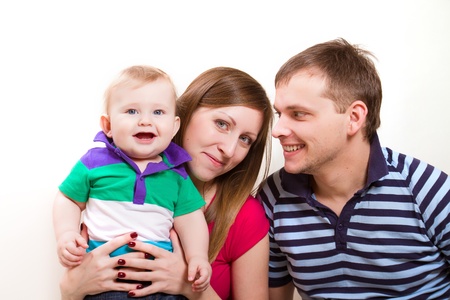 Happy faces of an young family