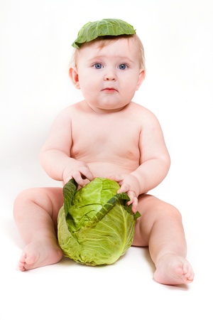 Baby with cabbage , studioの写真素材