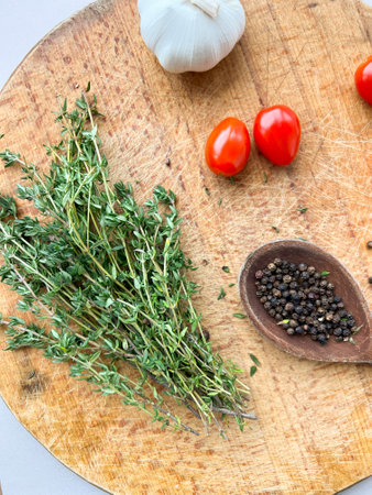 herbs and spices. Thyme, garlic, tomatoes and pepper
