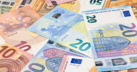 Twenty Euro banknote fragment macro. Closeup photo of a part of the new twenty euro note. Money of...