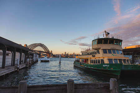 Sydney, Australia - October 14, 2020: The green yellow ferries at Circular Quay, Sydney Australia....