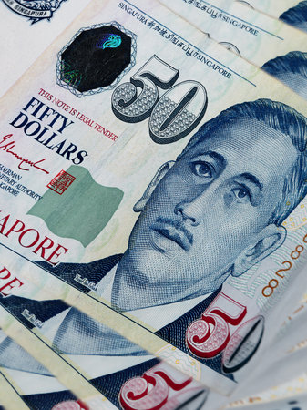 Close up of 50 Singapore dollar. Currency of the City-state of Singapore. Bunch of fifty Singaporean...