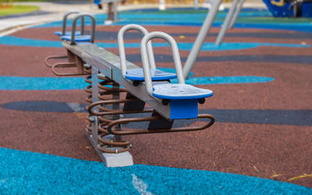 Cyberjaya, Malaysia - November 06, 2020: An abandoned seesaw in a playground. Playgrounds are...