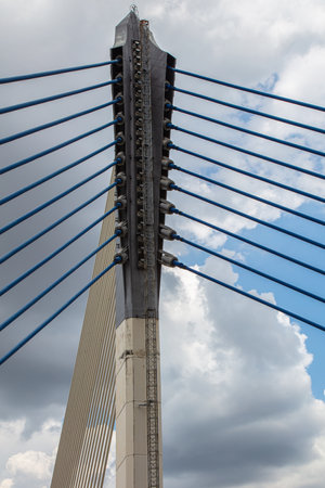 Close to the Seri Saujana Bridge in Putrajaya, Malaysia the Malaysian Government city 40 km outside of Kuala Lumpur. Close up to the steel cable structure of the Putrajaya bridge.のeditorial素材