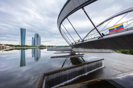 Early morning, before sunrise at Putrajaya bridge in the artificially grown city of Putrajaya, Selangor, wide angle capture of cable stayed bridge. Putrajaya Dam and Bridgeのeditorial素材