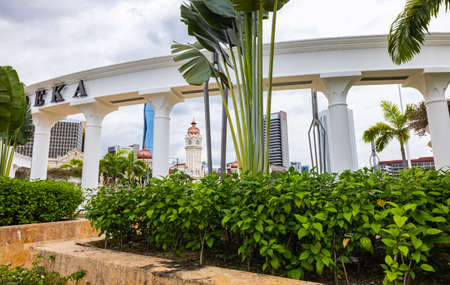 Kuala Lumpur, Malaysia - January 10, 2021 -  Cityscape at the Merdeka Square in Kuala Lumpur. The  Sultan Abdul Samad building and the new Merdeka 118 tower appears behind the plants.のeditorial素材
