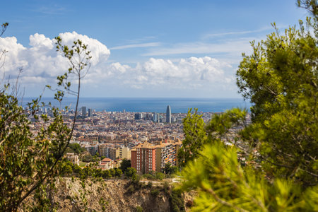 Aerial view over the skyline of Barcelona. Panoramic wide angle view from the summit of Carmel bunkers, a viewpoint from which you can see the whole city. It is located at the top of TurÃ³ de la Roviraのeditorial素材