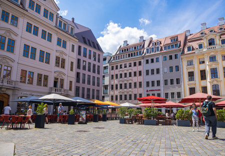 Dresden, Germany - June 28, 2022: Restaurants behind the Frauenkirche, with the the Augustiner, invite tourists to linger in a historical setting. The cityscape of the old town is constantly changingのeditorial素材