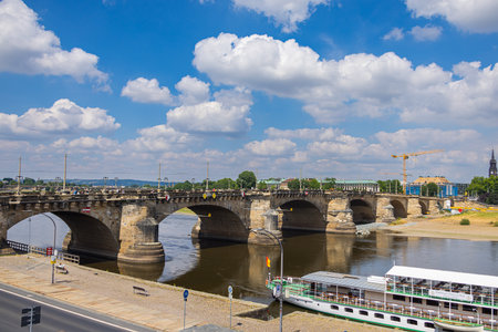 Dresden, Germany - June 28, 2022: Augustus bridge or Augustusbruecke on a sunny summer day. View from the Bruehl's Terrace (BrÃ¼hlsche Terrasse) over the river Elbe and the King's Shore "Koenigsufer"のeditorial素材