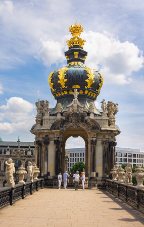Dresden, Germany - June 28, 2022: The crown gate with the long galleries adjoining on both sides in the Dresdner Zwinger. Located near the inner old town. The roof with the golden ornamentsのeditorial素材